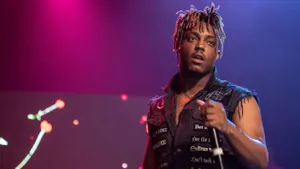 Juice Wrld Takes The Stage Wallpaper