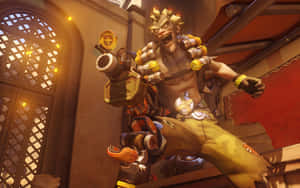 Junkrat Sits Atop A Crumbling Structure With A Mischievous Smirk Wallpaper