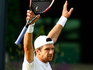 Jurgen Melzer With Raised Arms Wallpaper