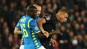 Kalidou Koulibaly Tussling With Opponent Wallpaper