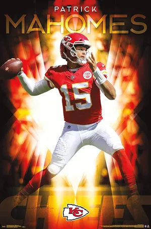 Kansas City Chiefs Quarterback Pat Mahomes On The Field With His Phone Wallpaper