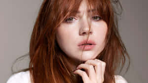 Karen Gillan With Hand On Chin Wallpaper