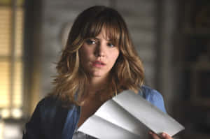 Katharine Mc Phee Holding Papers Wallpaper