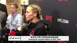 Katlyn Chookagian Being Interviewed Wallpaper