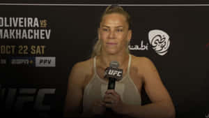 Katlyn Chookagian Holding A Microphone Wallpaper