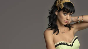 Katy Perry Stuns In A Yellow Dress Wallpaper