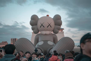 Kaws Companion Inflatable Sculpture Wallpaper