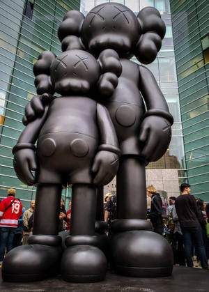 Kaws Statue In Detroit City Wallpaper