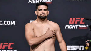 Kelvin Gastelum, Secure And Focused In The Cage Wallpaper