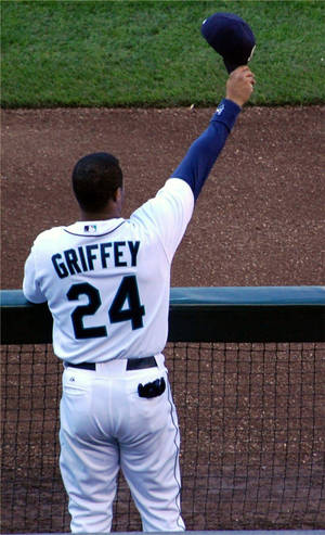 Ken Griffey Jr. Raising Mariners Hat Wallpaper