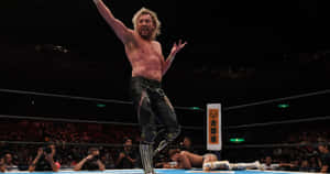 Kenny Omega Gesturing King Of Pro Wrestling Wallpaper