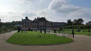 Kensington Palace Surrounded By Tourists Wallpaper