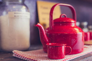 Kettle On Checkered Cloth Wallpaper