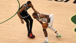 Khris Middleton Vs. Kevin Durant Wallpaper