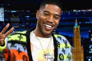 Kid Cudi Peace Sign T V Show Appearance Wallpaper