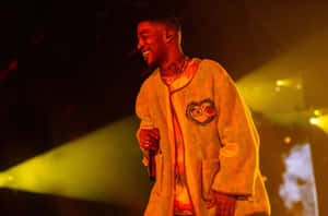 Kid Cudi Performing Live On Stage.jpg Wallpaper