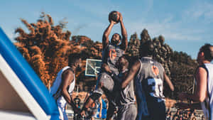 Kids Playing Basketball At The Park Wallpaper