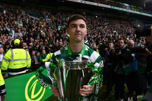 Kieran Tierney Holding A Trophy Wallpaper