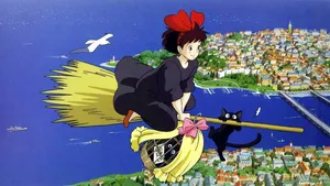 Kiki Flying Over The City On Her Broom With Jiji Wallpaper