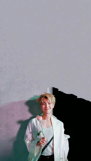 Kim Namjoon Holding A Rose Wallpaper