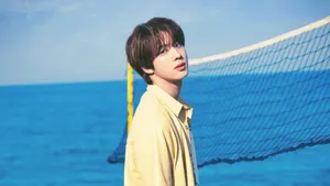 Kim Seok Jin Enjoying A Day At The Beach Wallpaper