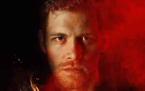 Klaus Mikaelson With Red Smoke Wallpaper