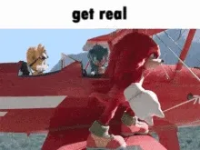 Knuckles Strikes A Weightlifting Pose With Power And Grace Wallpaper