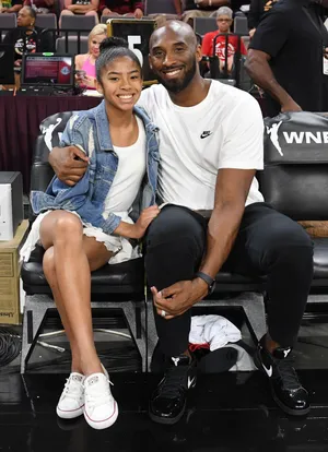 Kobe Bryant And Daughter Gigi - A Father-daughter Bond To Last Forever Wallpaper