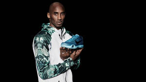 Kobe Bryant Modeling Nike Shoe 4k Wallpaper