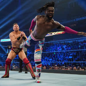 Kofi Kingston In Action Against The Miz Wallpaper