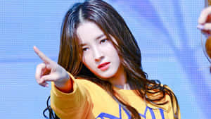 Kpop Star Pointing Gesture Wallpaper