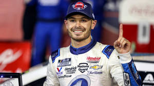 Kyle Larson Equipped In His Signature White Racing Suit Wallpaper