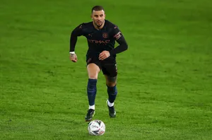 Kyle Walker Running On The Field Wallpaper