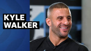 Kyle Walker Smiling To The Side Wallpaper