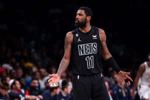 Kyrie Irving Of The Brooklyn Nets Captures The Crowd Wallpaper