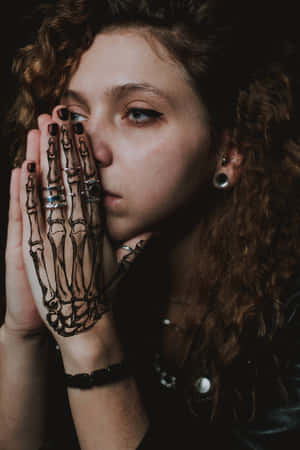 Lady With Skeletal Hand Tattoo Wallpaper