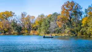 Lake With Boat Early Fall Wallpaper