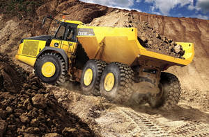 Large Yellow John Deere Dump Truck Wallpaper