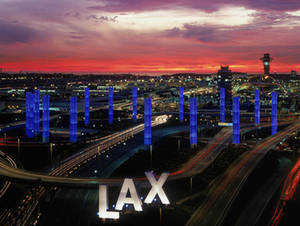 Lax Terminal Under A Stunning Sunset Sky Wallpaper