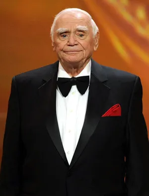 Legendary Actor Ernest Borgnine In Classic Formal Attire Wallpaper