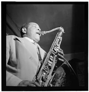 Legendary Jazz Musician Coleman Hawkins In Action Wallpaper