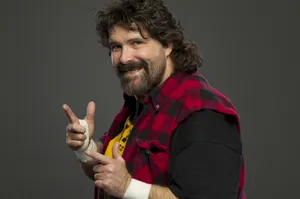 Legendary Pro-wrestler Mick Foley In Action Wallpaper
