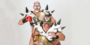 Legendary_ Tag_ Team_ Wrestlers_with_ Championship_ Belts Wallpaper