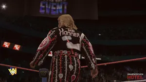 Legendary Wrestling Icon, Greg Valentine, Glancing Back Over His Shoulder. Wallpaper