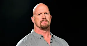 Legendary Wwe Star Steve Austin In The Ring Wallpaper