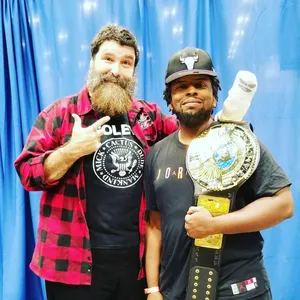 Legendary Wwe Wrestler Mick Foley At Summerslam Event Wallpaper