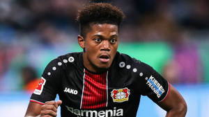 Leon Bailey Leverkusen Black Jersey Wallpaper