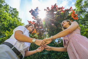 Lesbian Couple Holding Hands Wallpaper