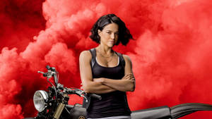 Letty Ortiz, The Fearless Racer From The Fast And Furious Series, Embodied In A Captivating Desktop Image. Wallpaper