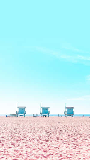 Lifeguard Huts On The Beach Wallpaper